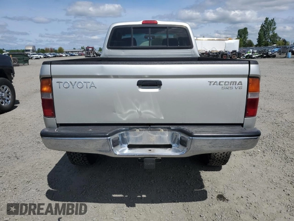 2000 Toyota Tacoma with VIN 5TEWN72N8YZ717707, listed as a Copart auction lot 54479455 with 197,407 mi miles and Salvage title. Bid and sale history available at DreamBid. Image 6.
