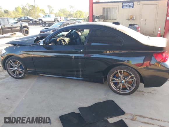 2016 BMW 2 Series M235i with VIN WBA1J7C55GV360926, listed as a IAAI auction lot 41482584 with 60,172 mi miles. Bid and sale history available at carsss.com. Image 14.