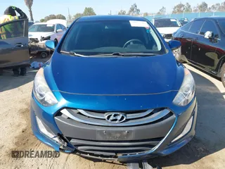 2014 Hyundai Elantra GT with VIN KMHD35LHXEU230812, listed as a IAAI auction lot 41855509 with 122,729 mi miles. Bid and sale history available at carsss.com. Image 12.