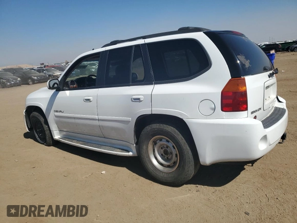2006 GMC Envoy Denali with VIN 1GKET63M062277442, listed as a Copart auction lot 59787724 with 231,882 mi miles and Salvage Title. Bid and sale history available at carsss.com. Image 2.