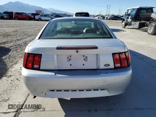 2003 Ford Mustang Standard z VIN 1FAFP40463F327722, wystawiony jako Copart lot #55042765 z przebiegiem 117 010 mil mil oraz Szkoda całkowita • Salvage title. Historia ofert i sprzedaży dostępna na DreamBid. Obrazek 6.