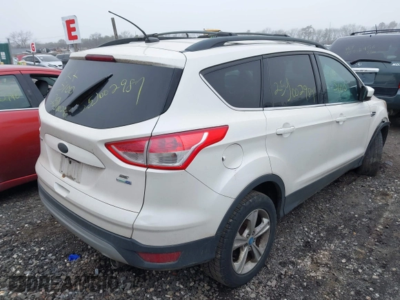 2013 Ford Escape SE with VIN 1FMCU9G96DUC32901, listed as a IAAI auction lot 41852421 with 999,999 mi miles. Bid and sale history available at carsss.com. Image 4.