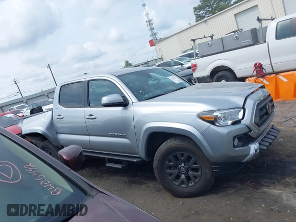 2023 Toyota Tacoma SR with VIN 3TYCZ5AN2PT176554, listed as a IAAI auction lot 42148651 with 15,255 mi miles and . Bid and sale history available at DreamBid. Image 13.