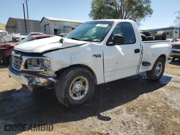 2000 Ford F-150 XL with VIN 1FTZF0727YKA84301, listed as a Copart auction lot 71593544 with 0 mi miles and Salvage Title. Bid and sale history available at carsss.com. Image 1.