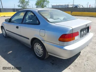 1997 Honda Civic DX with VIN 1HGEJ6220VL106203, listed as a IAAI auction lot 42098813 with 192,343 mi miles. Bid and sale history available at carsss.com. Image 3.