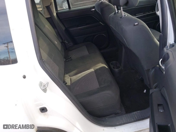 2012 Jeep Compass Latitude with VIN 1C4NJDEB5CD584509, listed as a IAAI auction lot 41672784 with 166,271 mi miles. Bid and sale history available at carsss.com. Image 8.