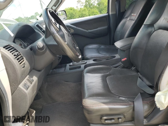 2012 Nissan Frontier Pro-4X z VIN 1N6AD0EV4CC405470, wystawiony jako Copart lot #54186715 z przebiegiem Nie podano mil oraz Szkoda całkowita • Salvage title. Historia ofert i sprzedaży dostępna na DreamBid. Obrazek 7.
