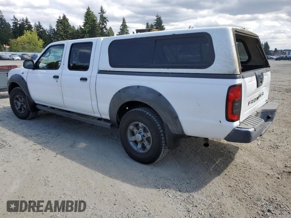 2003 Nissan Frontier XE with VIN 1N6ED29X13C419979, listed as a Copart auction lot 65806585 with 167,535 mi miles and Salvage title. Bid and sale history available at DreamBid. Image 2.