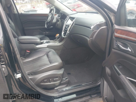 2015 Cadillac SRX Premium Collection with VIN 3GYFNGE30FS634363, listed as a IAAI auction lot 42672064 with 146,821 mi miles and . Bid and sale history available at DreamBid. Image 5.