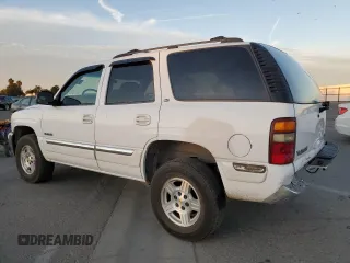 2002 GMC Yukon SLE with VIN 1GKEK13T12R143778, listed as a Copart auction lot 81387104 with 213,129 mi miles and Salvage Title. Bid and sale history available at carsss.com. Image 2.