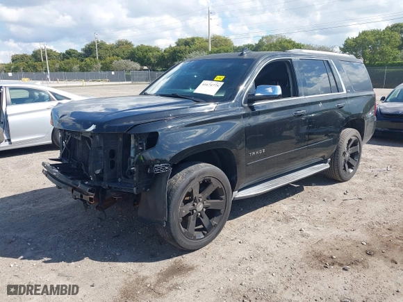 2015 Chevrolet Tahoe LTZ with VIN 1GNSCCKC7FR746028, listed as a IAAI auction lot 41674775 with 198,067 mi miles. Bid and sale history available at carsss.com. Image 18.