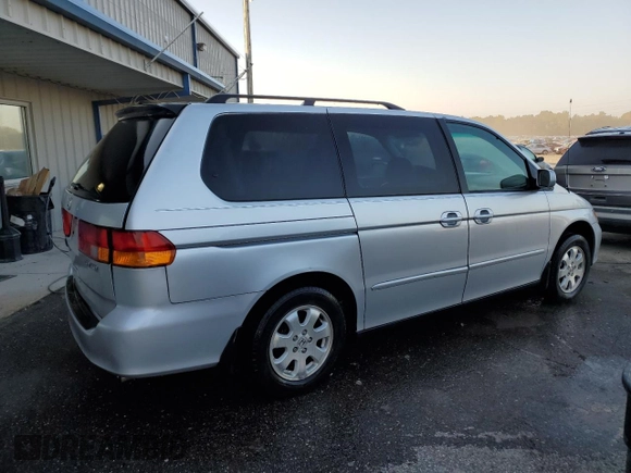 2003 Honda Odyssey EX-L with VIN 5FNRL18943B159553, listed as a Copart auction lot 72025294 with 182,942 mi miles and Salvage Title. Bid and sale history available at DreamBid. Image 3.