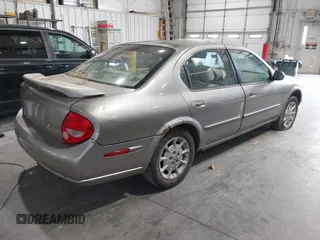2000 Nissan Maxima GXE z VIN JN1CA31D0YT752131, wystawiony jako IAAI lot #42195984 z przebiegiem 249 040 mil mil oraz . Historia ofert i sprzedaży dostępna na DreamBid. Obrazek 4.