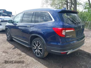 2019 Honda Pilot Touring 7-Passenger z VIN 5FNYF6H63KB000365, wystawiony jako IAAI lot #42154822 z przebiegiem 238 032 mil mil oraz . Historia ofert i sprzedaży dostępna na DreamBid. Obrazek 3.