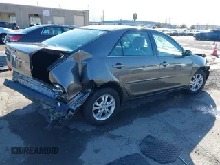 2004 Toyota Camry LE with VIN 4T1BF30K94U577260, listed as a IAAI auction lot 41906287 with 68,499 mi miles. Bid and sale history available at carsss.com. Image 4.
