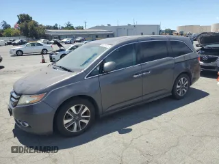 2014 Honda Odyssey Touring with VIN 5FNRL5H93EB120303, listed as a Copart auction lot 66285505 with 225,561 mi miles and Clean title. Bid and sale history available at DreamBid. Image 1.