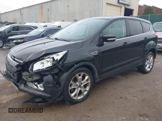 2013 Ford Escape SEL with VIN 1FMCU9H93DUC79592, listed as a IAAI auction lot 42039037 with 63,020 mi miles and . Bid and sale history available at DreamBid. Image 2.