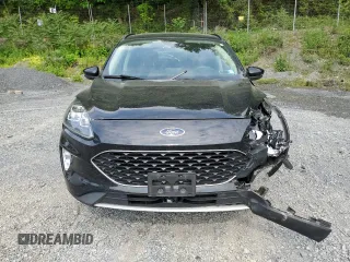 2020 Ford Escape Titanium с VIN 1FMCU9J97LUA20595, выставлен на аукционе Copart как лот 59476745 с пробегом 74 518 миль миль и Списание • Salvage title. История ставок и продаж доступна на DreamBid. Изображение 5.