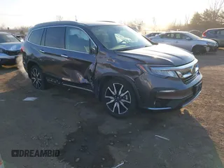 2019 Honda Pilot Touring 7-Passenger with VIN 5FNYF6H69KB050235, listed as a IAAI auction lot 41782057 with 85,907 mi miles. Bid and sale history available at carsss.com. Image 1.