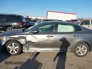 2016 Kia Optima LX with VIN 5XXGT4L39GG102599, listed as a IAAI auction lot 41748147 with 104,712 mi miles. Bid and sale history available at carsss.com. Image 14.