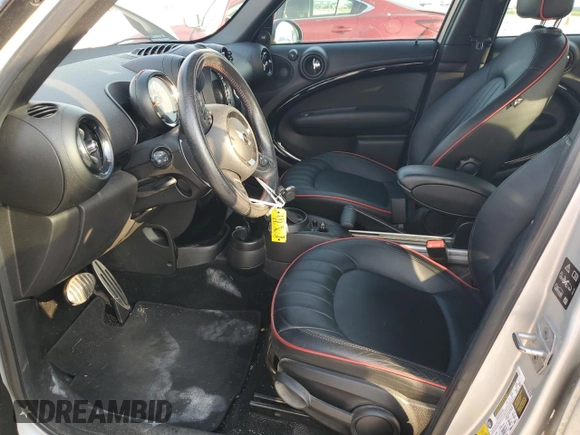 2016 MINI Countryman John Cooper Works with VIN WMWXD1C59GWT97602, listed as a Copart auction lot 52898605 with 141,749 mi miles and Salvage Title. Bid and sale history available at DreamBid. Image 7.