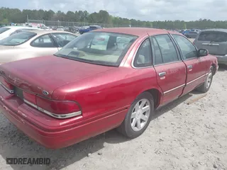 1996 Ford Crown Victoria with VIN 2FALP73W9TX127763, listed as a IAAI auction lot 41935853 with 1 mi miles. Bid and sale history available at carsss.com. Image 4.