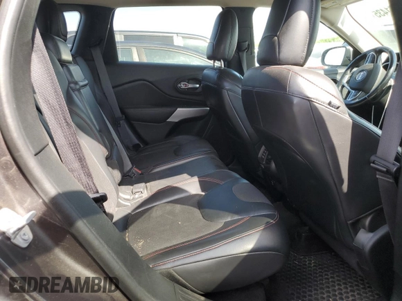2017 Jeep Cherokee Trailhawk with VIN 1C4PJMBS0HW589626, listed as a Copart auction lot 53981435 with 105,318 mi miles and Salvage title. Bid and sale history available at DreamBid. Image 11.
