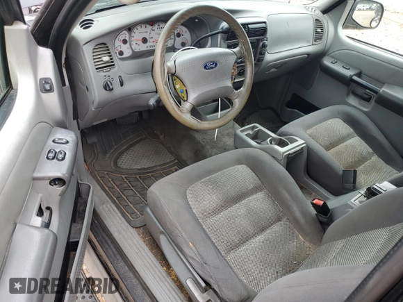 2003 Ford Explorer Sport XLS with VIN 1FMYU60E53UC04632, listed as a Copart auction lot 51465055 with 217,732 mi miles and Salvage title. Bid and sale history available at DreamBid. Image 8.
