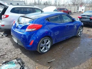 2013 Hyundai Veloster w/Black Int with VIN KMHTC6ADXDU170420, listed as a IAAI auction lot 41655443 with 157,800 mi miles and . Bid and sale history available at DreamBid. Image 4.