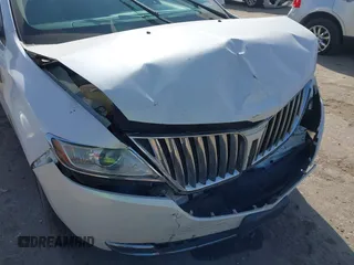 2013 Lincoln MKX with VIN 2LMDJ6JK0DBL02510, listed as a IAAI auction lot 41775660 with 137,755 mi miles. Bid and sale history available at carsss.com. Image 6.