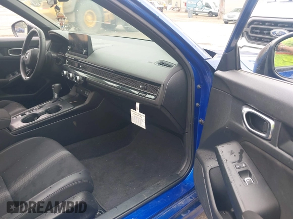 2023 Honda Civic Sport with VIN 2HGFE2F57PH508645, listed as a IAAI auction lot 42346761 with 28,748 mi miles and . Bid and sale history available at DreamBid. Image 5.
