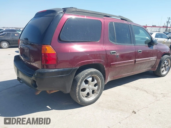 2003 GMC Envoy SLE with VIN 1GKES16S036238094, listed as a IAAI auction lot 41660209 with Not Provided miles and . Bid and sale history available at DreamBid. Image 4.