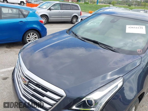 2019 Cadillac XT5 Luxury FWD with VIN 1GYKNCRS7KZ199542, listed as a IAAI auction lot 42032139 with 79,487 mi miles and . Bid and sale history available at DreamBid. Image 6.