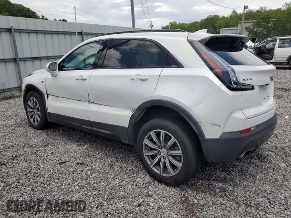 2019 Cadillac XT4 FWD Sport with VIN 1GYFZER44KF210582, listed as a Copart auction lot 61272015 with 104,073 mi miles and Salvage title. Bid and sale history available at DreamBid. Image 2.