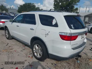 2013 Dodge Durango Crew with VIN 1C4RDHDGXDC608209, listed as a IAAI auction lot 42779231 with 203,460 mi miles and . Bid and sale history available at DreamBid. Image 3.