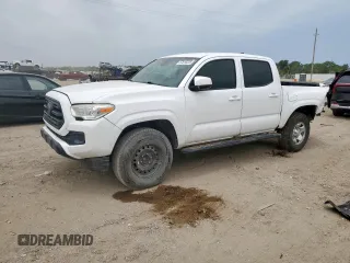 2018 Toyota Tacoma SR with VIN 5TFAX5GN4JX119838, listed as a Copart auction lot 57816235 with 157,199 mi miles and Salvage title. Bid and sale history available at DreamBid. Image 1.