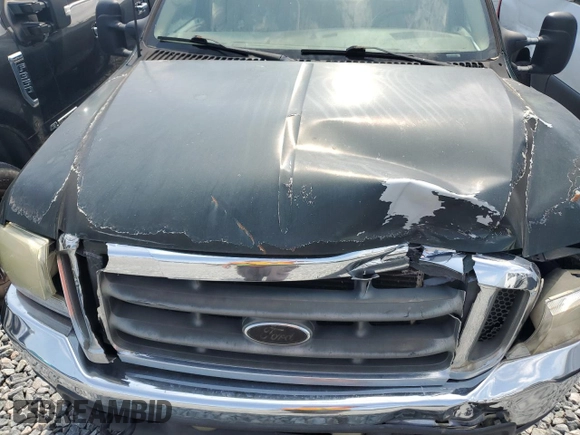 2002 Ford F-250 XL z VIN 1FTNX21F92EA00598, wystawiony jako Copart lot #58231845 z przebiegiem 178 784 mil mil oraz Szkoda całkowita • Salvage title. Historia ofert i sprzedaży dostępna na DreamBid. Obrazek 12.