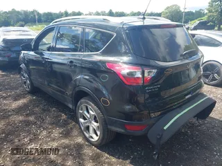 2018 Ford Escape Titanium with VIN 1FMCU9J94JUC98805, listed as a IAAI auction lot 42718214 with 36,689 mi miles and . Bid and sale history available at DreamBid. Image 3.