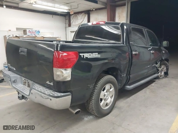 2007 Toyota Tundra LTD with VIN 5TBDV58147S490830, listed as a IAAI auction lot 41823276 with 294,520 mi miles. Bid and sale history available at carsss.com. Image 4.