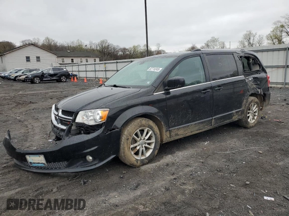 2019 Dodge Grand Caravan SXT with VIN 2C4RDGCG4KR580424, listed as a Copart auction lot 52715245 with 130,696 mi miles and Salvage Title. Bid and sale history available at DreamBid. Image 1.