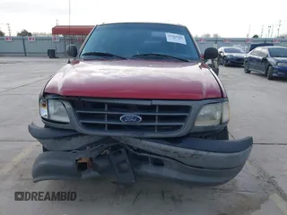 2003 Ford F-150 XL with VIN 1FTRX17213NB65093, listed as a IAAI auction lot 41568065 with 286,293 mi miles. Bid and sale history available at carsss.com. Image 12.