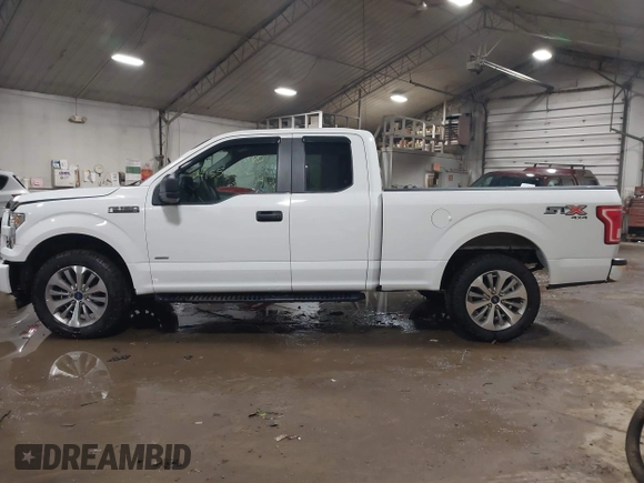 2017 Ford F-150 XL with VIN 1FTEX1EP4HFC84612, listed as a IAAI auction lot 41553736 with 145,235 mi miles. Bid and sale history available at carsss.com. Image 14.