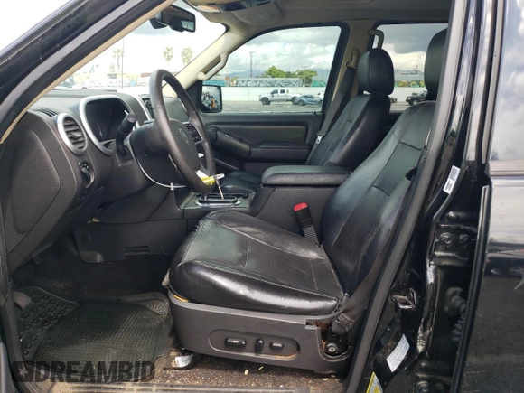 2006 Mercury Mountaineer Premier with VIN 4M2EU38806UJ13528, listed as a Copart auction lot 57497004 with 180,463 mi miles and Salvage Title. Bid and sale history available at carsss.com. Image 7.