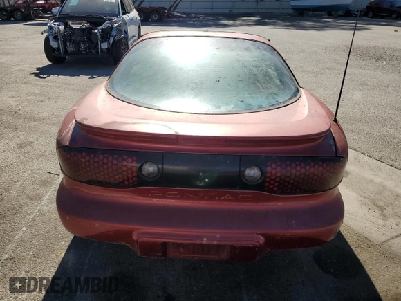 1998 Pontiac Firebird Firebird z VIN 2G2FS22K6W2202173, wystawiony jako Copart lot #77708594 z przebiegiem Nie podano mil oraz Czysty tytuł • Clean title. Historia ofert i sprzedaży dostępna na DreamBid. Obrazek 6.