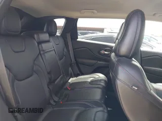 2014 Jeep Cherokee Trailhawk with VIN 1C4PJMBS5EW231448, listed as a IAAI auction lot 42632143 with 97,461 mi miles and . Bid and sale history available at DreamBid. Image 8.