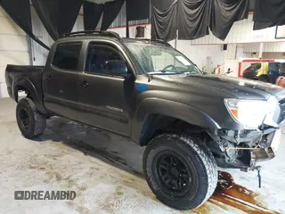 2015 Toyota Tacoma with VIN 3TMLU4EN9FM164933, listed as a IAAI auction lot 41447209 with 248,613 mi miles. Bid and sale history available at carsss.com. Image 1.