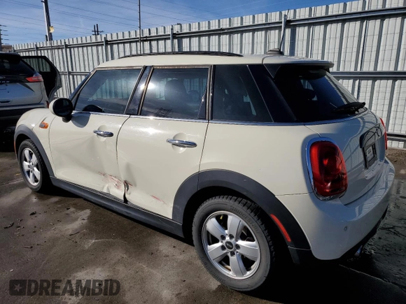 2019 MINI Hardtop 4 Door Cooper with VIN WMWXU1C57K2J01914, listed as a Copart auction lot 84330304 with 43,399 mi miles and Salvage Title. Bid and sale history available at DreamBid. Image 2.