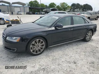 2015 Audi A8 L 4.0T with VIN WAU32AFD9FN024605, listed as a Copart auction lot 52086125 with 70,730 mi miles and Salvage Title. Bid and sale history available at carsss.com. Image 1.
