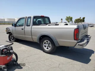 2004 Nissan Frontier XE with VIN 1N6DD26TX4C447116, listed as a Copart auction lot 59432335 with 127,001 mi miles and Salvage title. Bid and sale history available at DreamBid. Image 2.