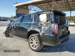 2019 GMC Yukon SLE with VIN 1GKS1AKC6KR302642, listed as a Copart auction lot 41510715 with 97,906 mi miles and Salvage Title. Bid and sale history available at carsss.com. Image 2.